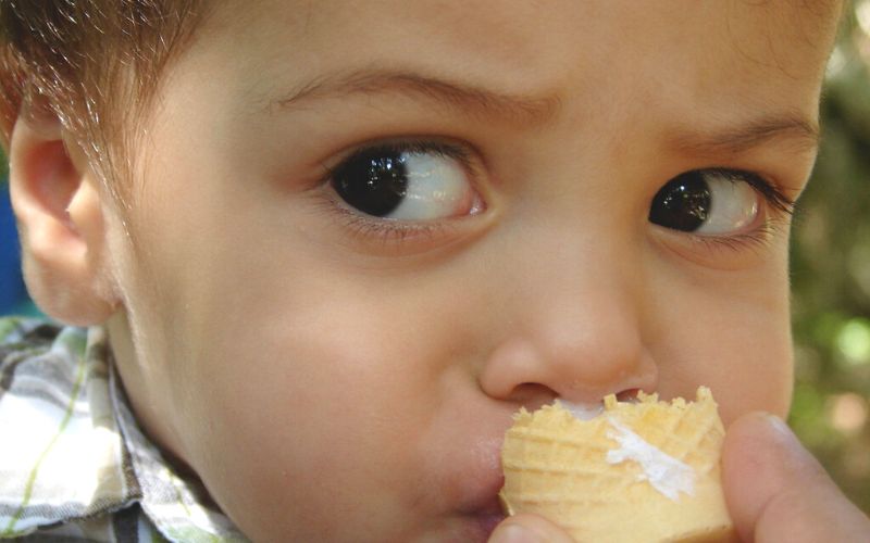 little boy eats ice cream